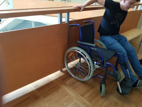 Presedanje na invalidski voziček