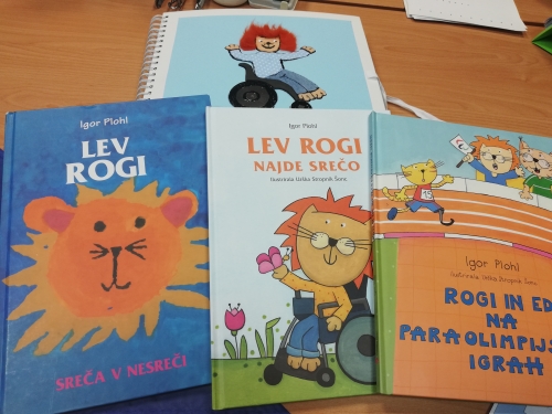 Tipna knjiga in tri slikanice Igorja Plohla: Lev Rogi, Lev Rogi najde srečo ter Rogi in Edi na paraolimpijskih igrah